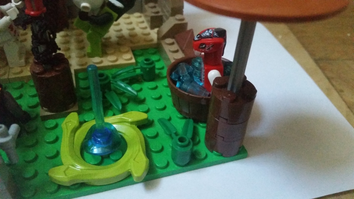 LEGO MOC - Инопланетная жизнь - Планета 'Земля змей' : 6. Тут виден телепорт и змея которая сидит в воде под зонтом. 